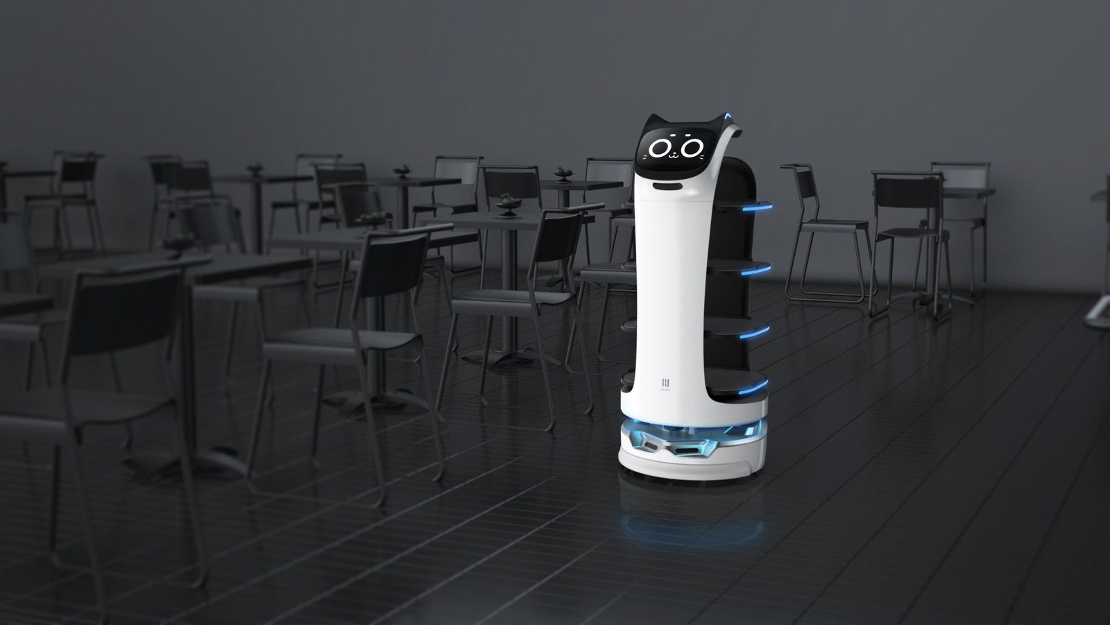 Un robot BellaBot entre taules d'un restaurant